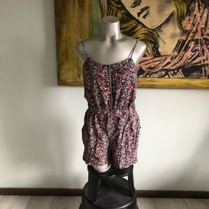 Forever 21 medium sized floral print romper Maine color navy with flower design